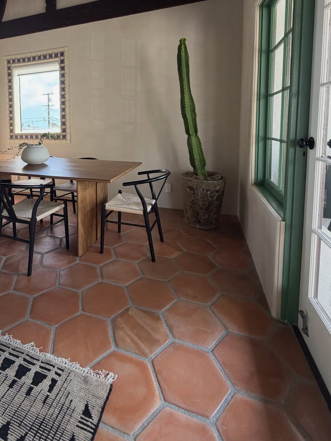 Warm terracotta Saltillo hex tile floor