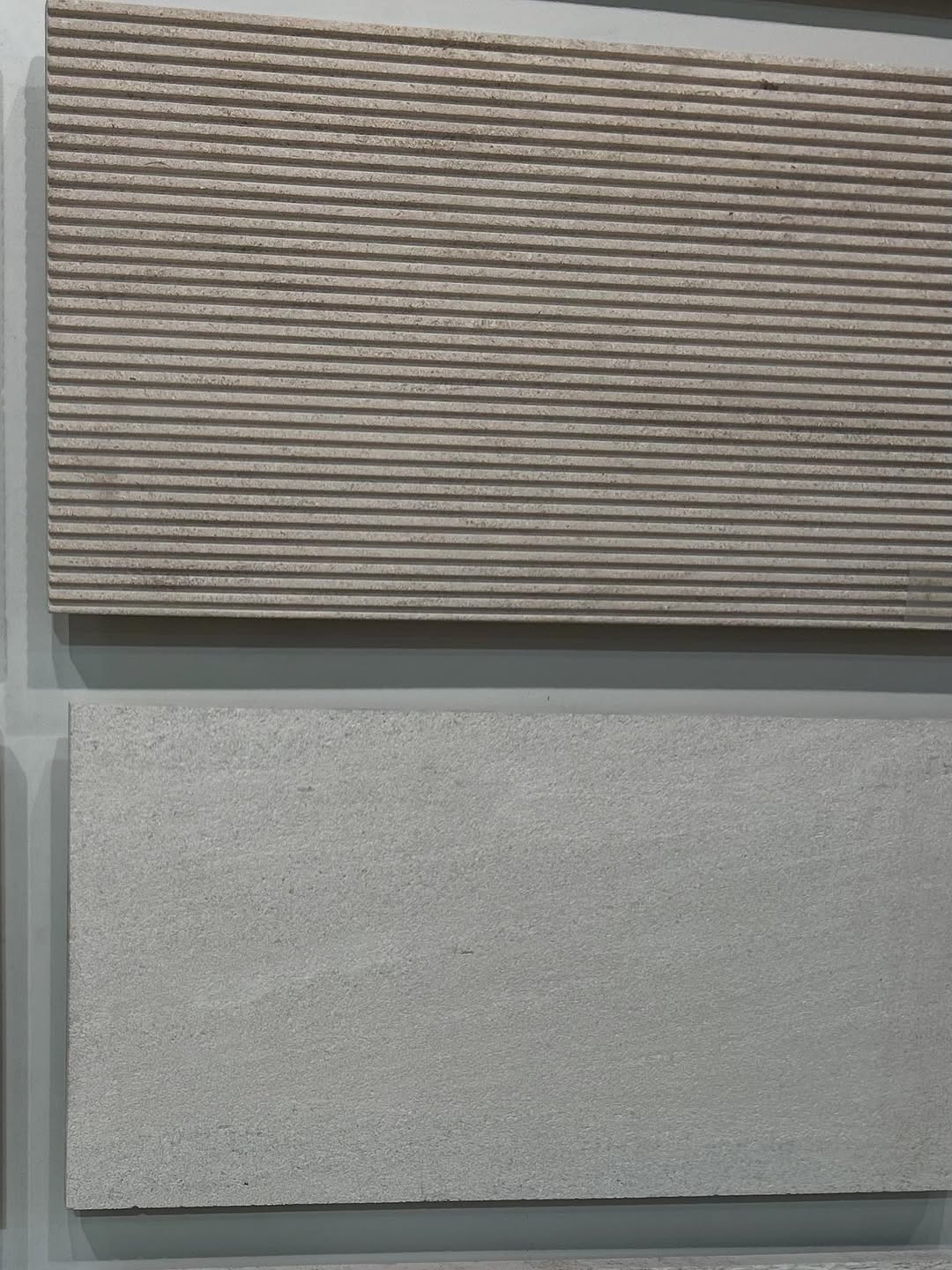Fluted stone and porcelain surface detail