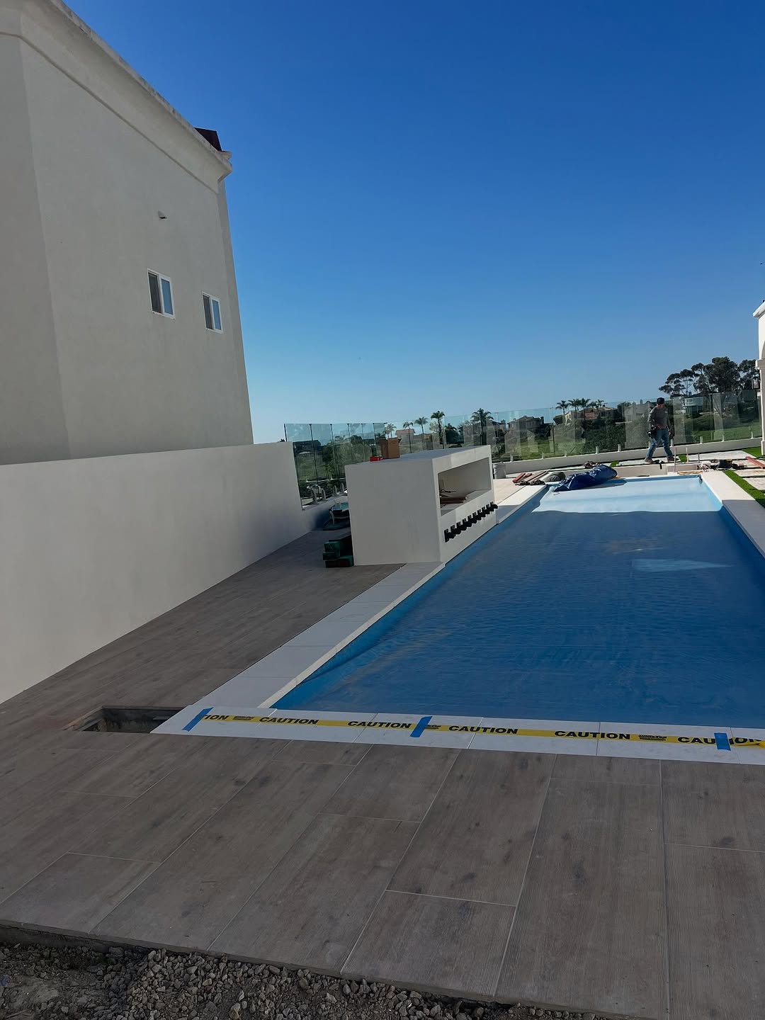 Tile pool deck overlooking the ocean
